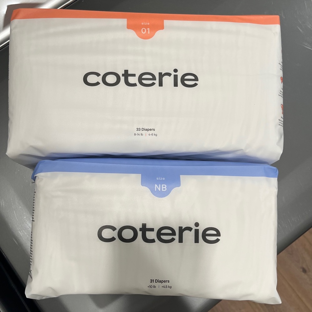 Unopened packages of Coterie Diapers